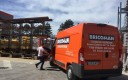 Bricoman, camion de livraison en Haute-Saône.