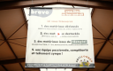 Entrepôt-magasin Articonnex avec panneau d'affichage des types de matériaux revendus.