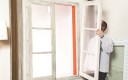 Dépose et repose de fenêtres dans un logement en rénovation.